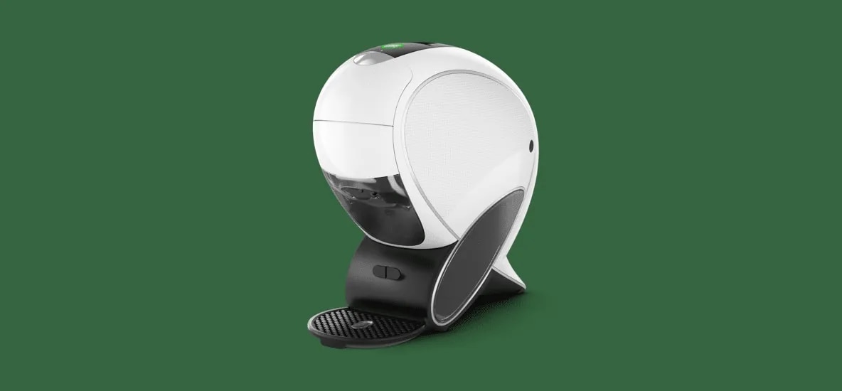 Máquina NESCAFÉ® Dolce Gusto® NEO em fundo verde escuro