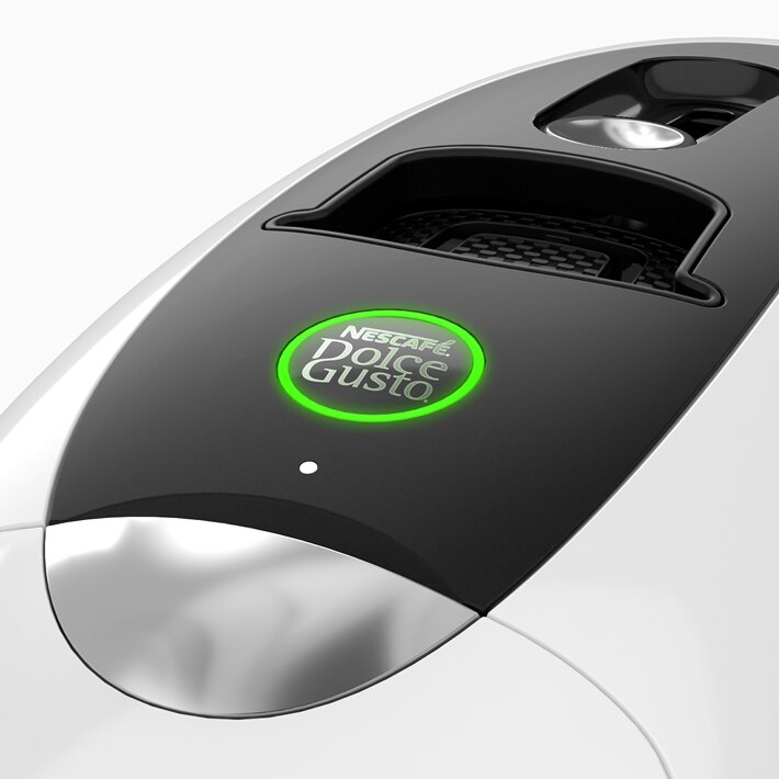 Máquina NEO Latte branca com o botão de início iluminado a verde